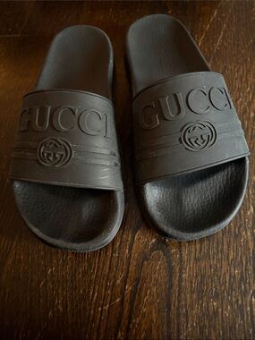 Gucci Black Embossed Logo Slide Sandals